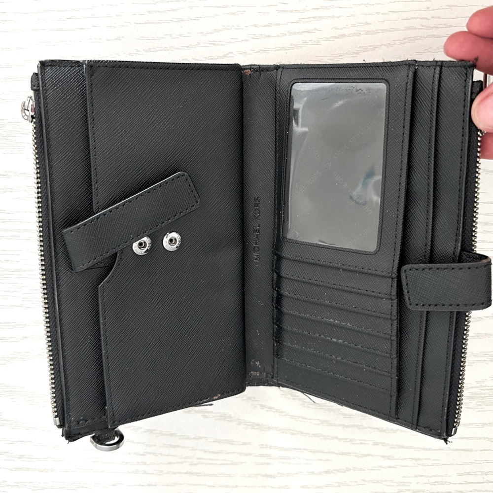 Gently used MK wallet black